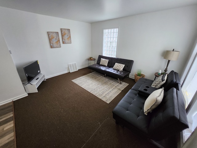 living room featuring dark hardwood / wood-style floors