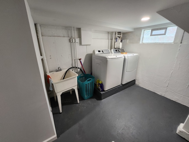 laundry area with separate washer and dryer