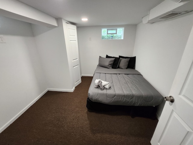 bedroom featuring dark carpet