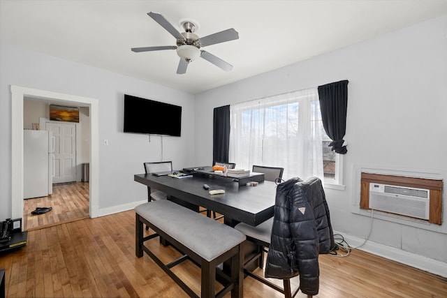 dining room featuring ceiling fan and light hardwood / wood-style flooring