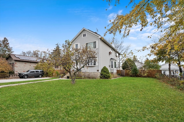 view of front of house with a front lawn