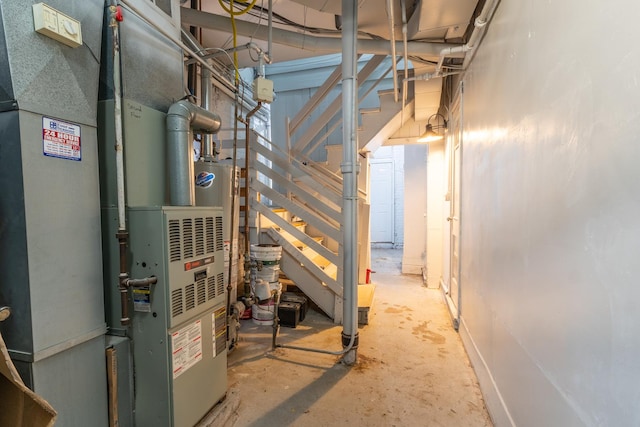 utility room with heating unit