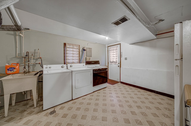 laundry area featuring washing machine and dryer