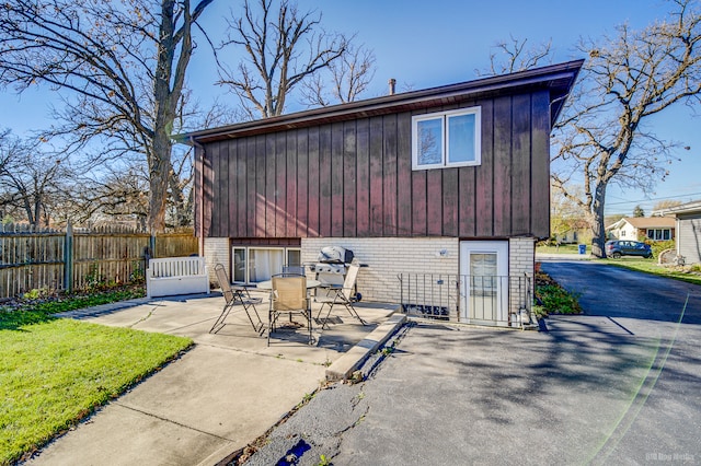 back of house with a patio area