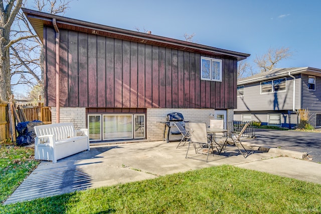 back of property featuring a patio area