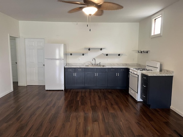 kitchen featuring dark hardwood / wood-style flooring, sink, white appliances, and ceiling fan