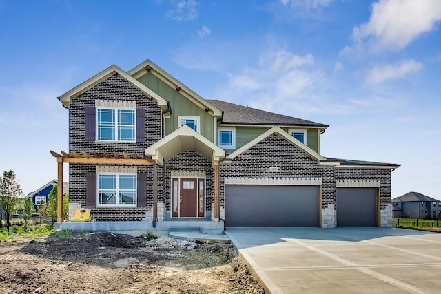 view of front of home with a garage