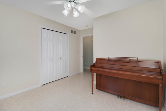 miscellaneous room with ceiling fan