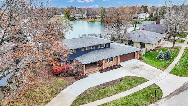 bird's eye view with a water view