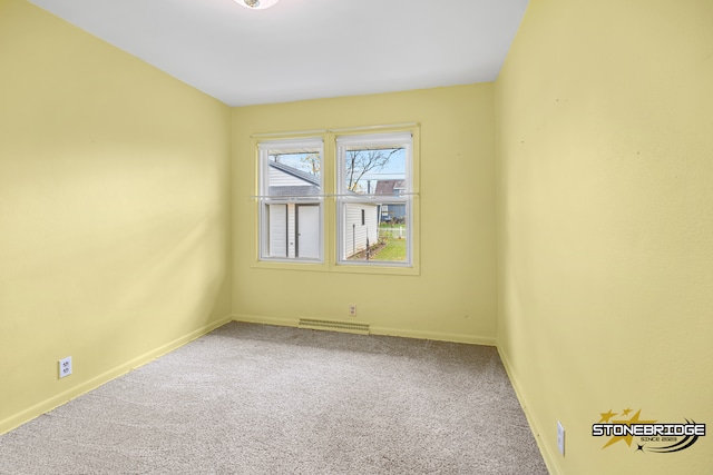 empty room with carpet floors