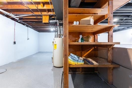 basement featuring gas water heater