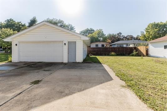 garage with a yard