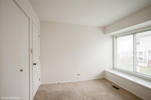 2028 Garden Ter, Hoffman Estates, IL 60169 - unfurnished bedroom with light carpet and a closet