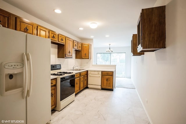 2028 Garden Ter, Hoffman Estates, IL 60169 - kitchen featuring white appliances, light marble finish floors, a chandelier, light countertops, and recessed lighting