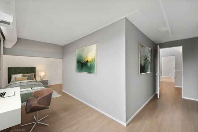 bedroom with light hardwood / wood-style flooring