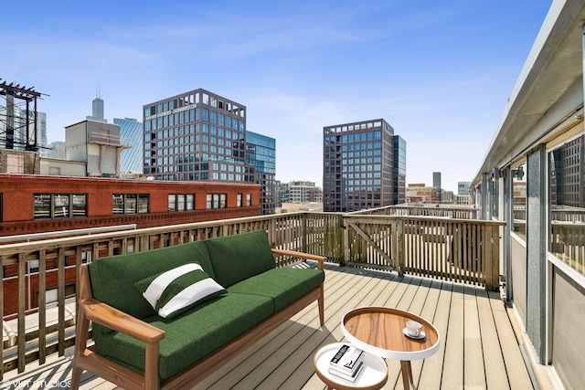 wooden terrace featuring an outdoor hangout area