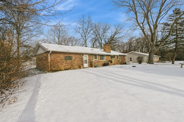 view of snow covered property