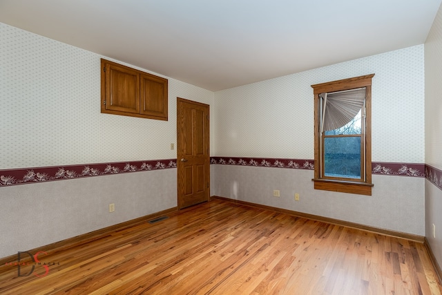 empty room featuring light wood-type flooring