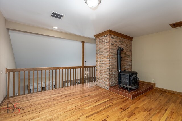 unfurnished living room with hardwood / wood-style floors