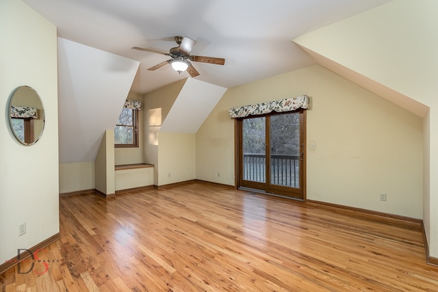 bonus room with ceiling fan, light hardwood / wood-style flooring, and lofted ceiling