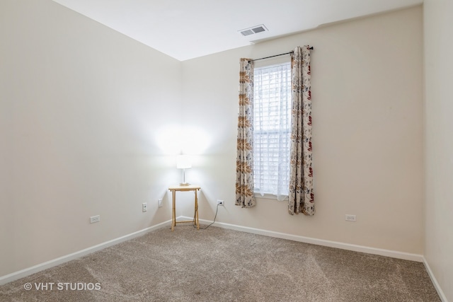 view of carpeted spare room