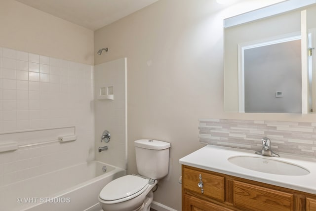 full bathroom with vanity, tasteful backsplash, toilet, and shower / bathtub combination