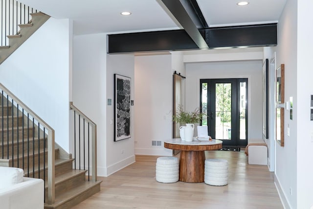 entrance foyer with light hardwood / wood-style floors