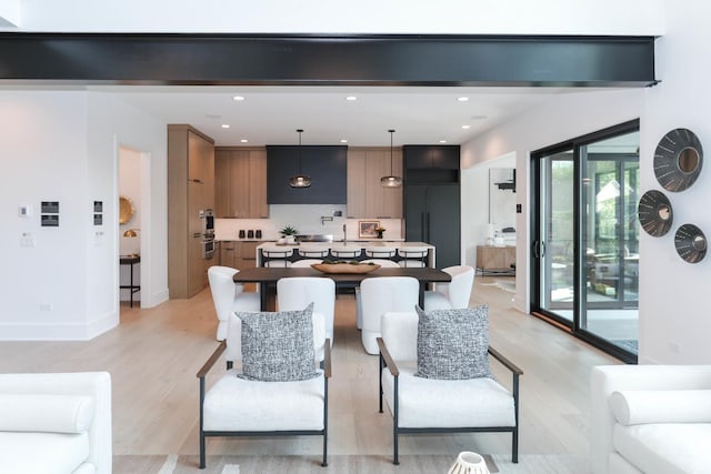 living room with light hardwood / wood-style flooring