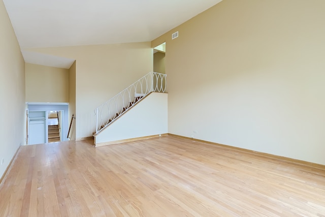 unfurnished living room with light hardwood / wood-style flooring