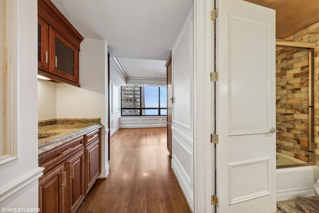 hall with dark hardwood / wood-style floors