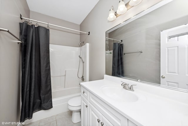 full bathroom featuring toilet, vanity, tile patterned floors, and shower / bath combo with shower curtain