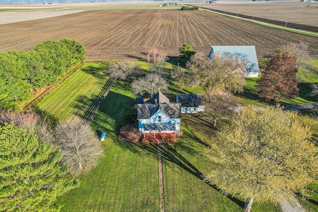 birds eye view of property featuring a rural view