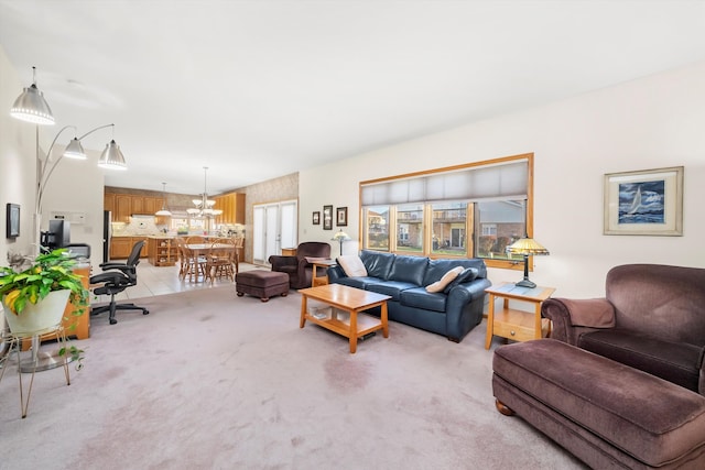 living room featuring light carpet