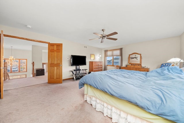 bedroom with ceiling fan and carpet