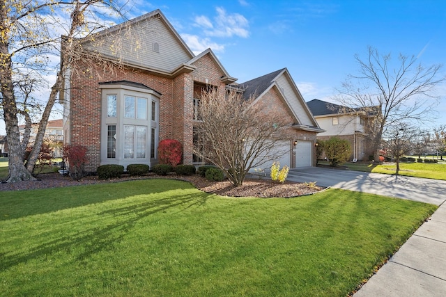 view of property featuring a front lawn and a garage