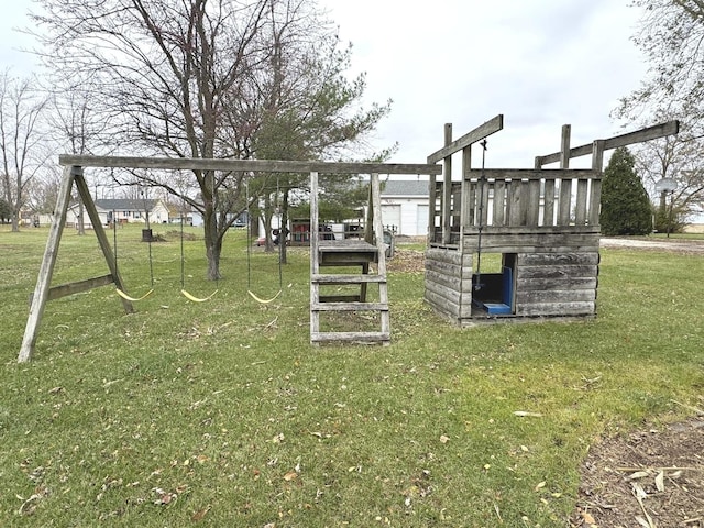 view of jungle gym featuring a lawn