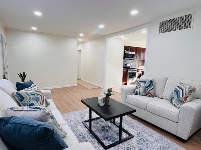 living room featuring light wood-type flooring