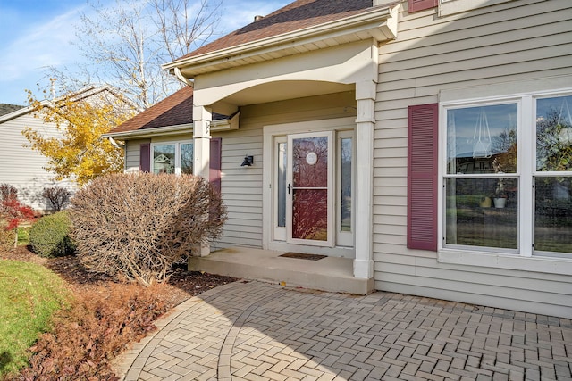 doorway to property with a patio area