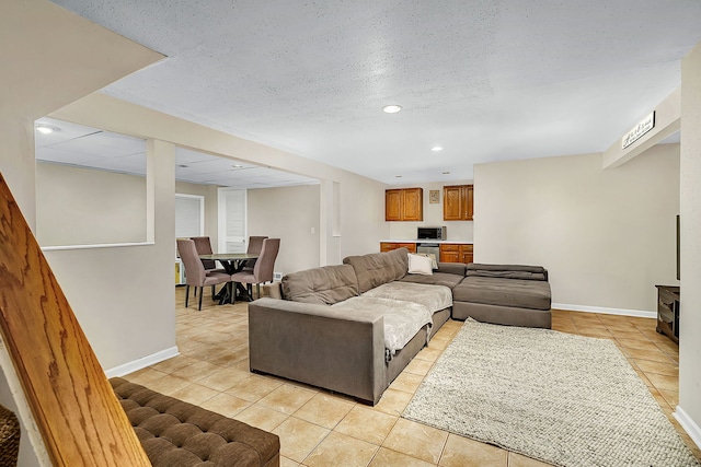 living room with light tile patterned floors