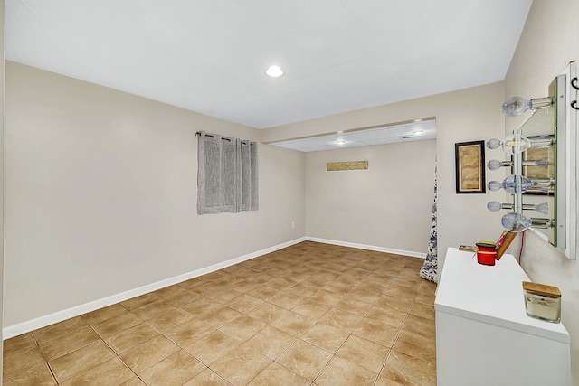 basement with tile patterned floors