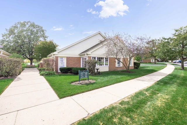 exterior space featuring a front lawn