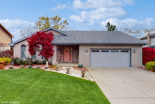 ranch-style home with a front yard and a garage