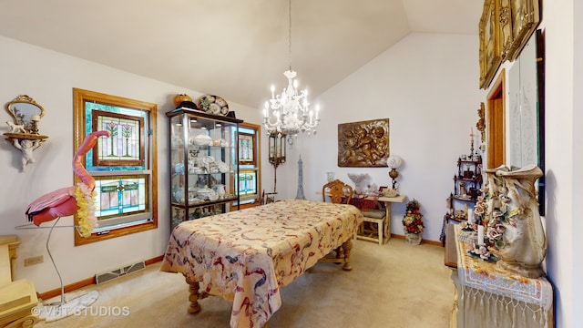 bedroom featuring light colored carpet, lofted ceiling, and a notable chandelier