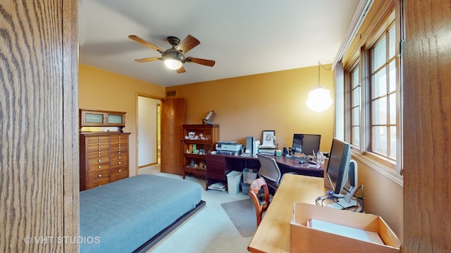 carpeted bedroom featuring ceiling fan