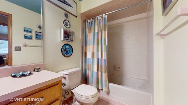 full bathroom featuring tile patterned flooring, shower / bath combination with curtain, vanity, and toilet