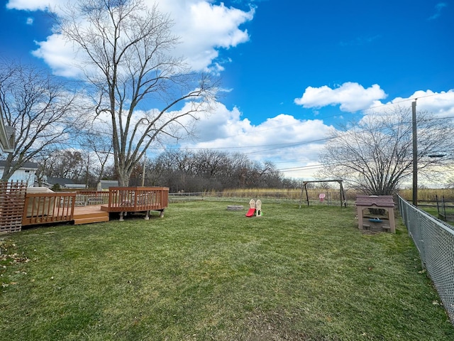 view of yard featuring a wooden deck