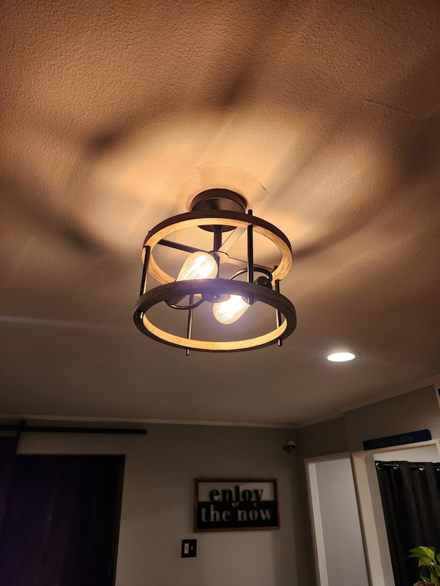 interior details featuring a textured ceiling