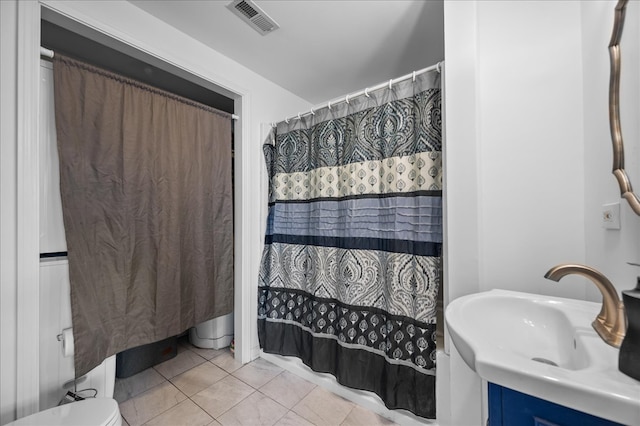 bathroom featuring tile patterned floors, vanity, and a shower with curtain