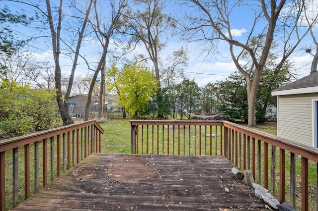 wooden deck with a yard