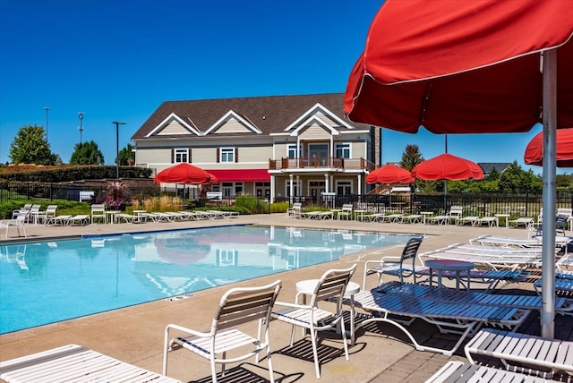 view of swimming pool featuring a patio